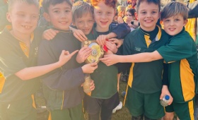 U9 boys celebrate their team success at Westbrook Hay Cross Country Event